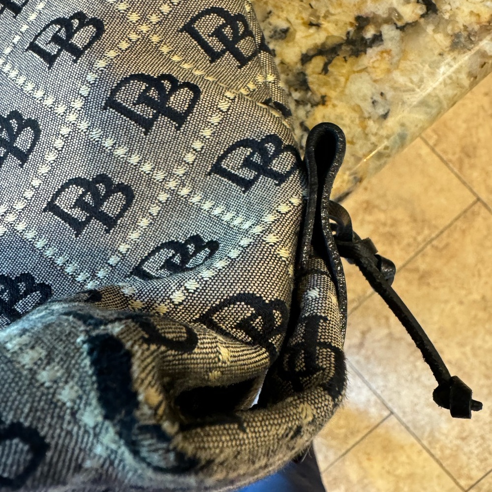 Dooney and Bourke cloth and leather square shoulder purse. - Picture 8 of 16